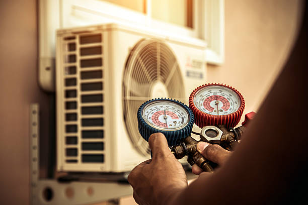 Professional Hvac technician working in Bellingham, MA